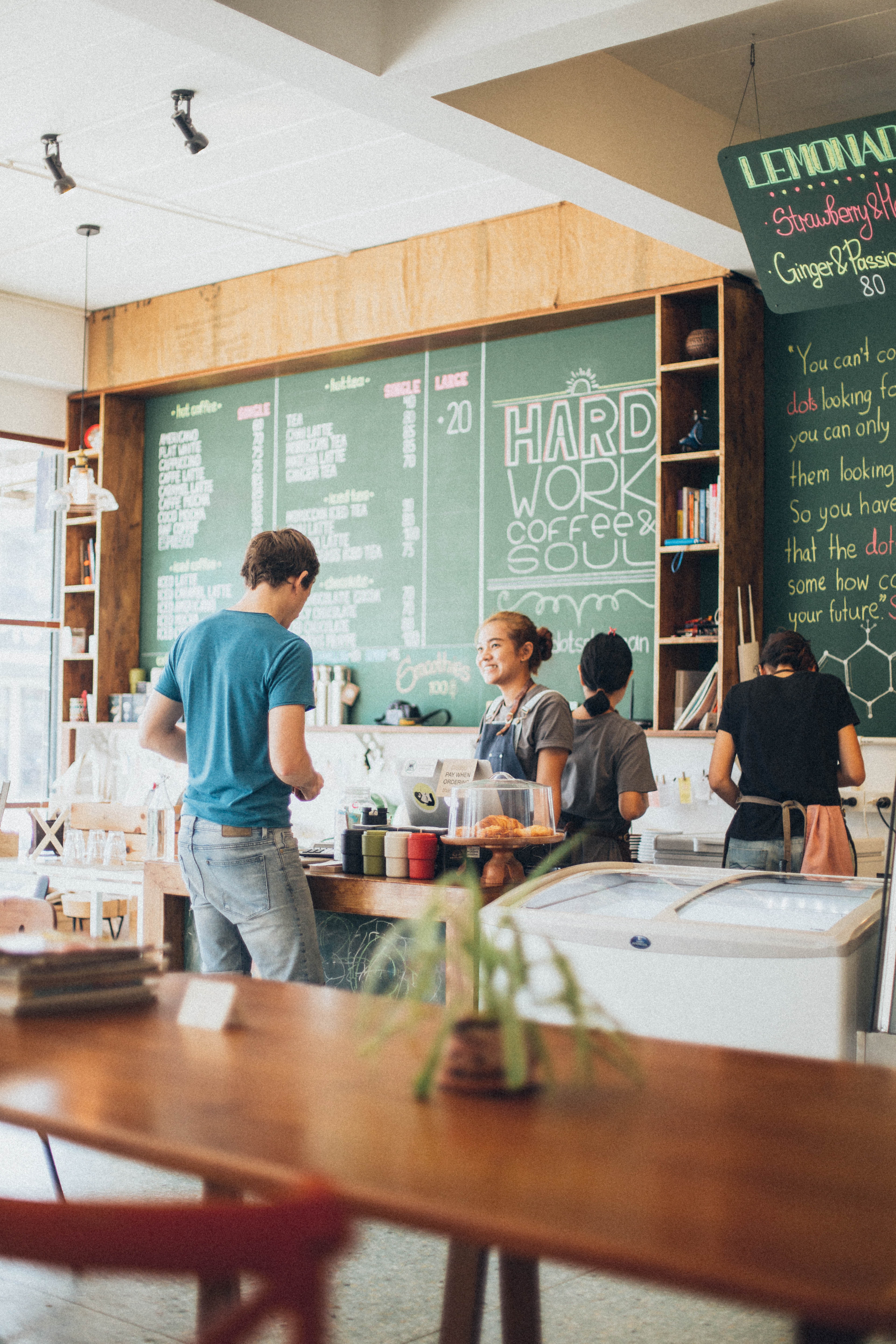 man-standing-near-barista-counter-1907098